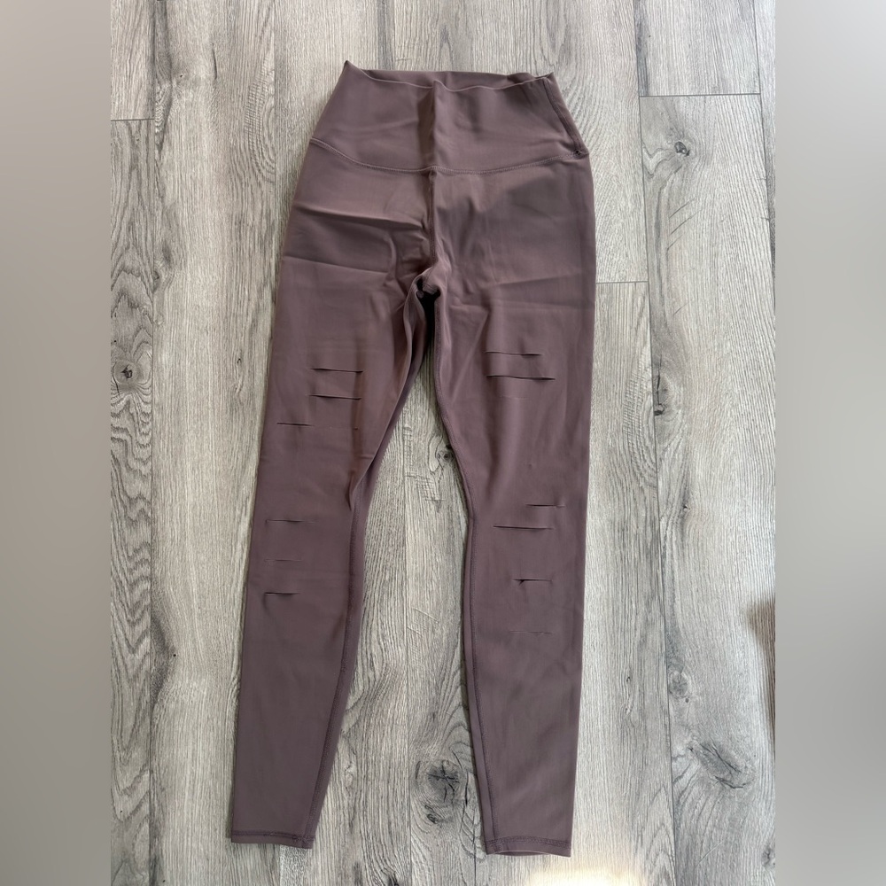 ALO Yoga Leggings in Brown with slit accents down front of legs